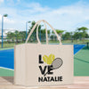 a white bag with a tennis racket on it