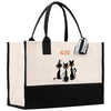 a black and white bag with two cats on it