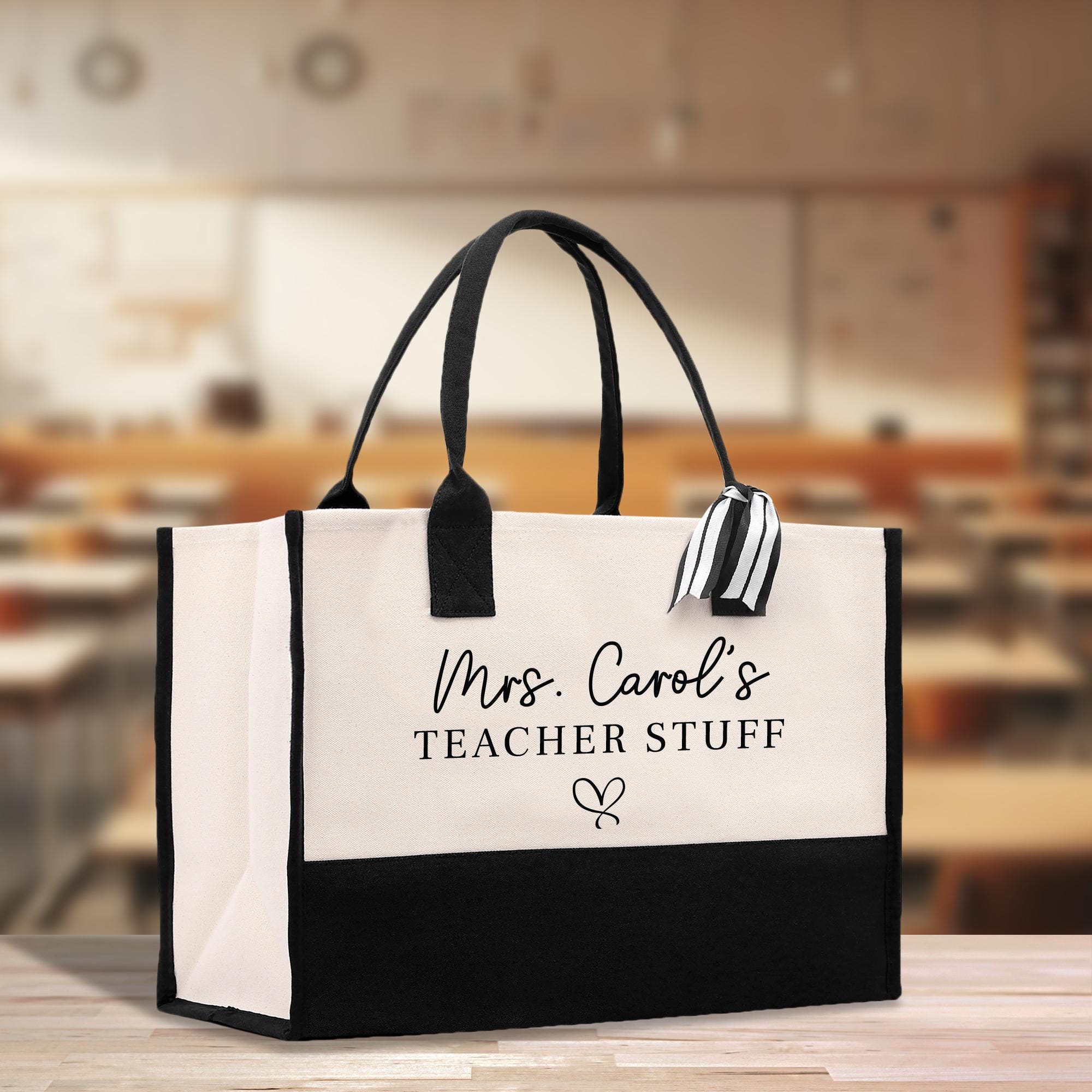 a black and white bag sitting on top of a table