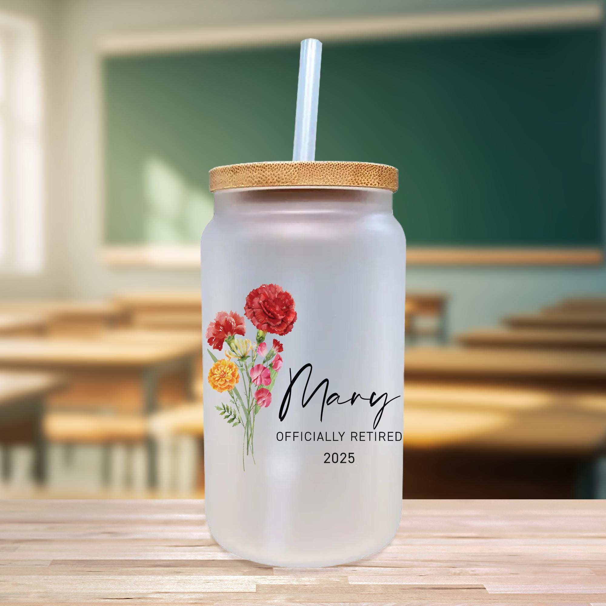 a glass with a straw in it sitting on a table