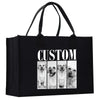 A black tote bag with a custom dog photo printed on it.