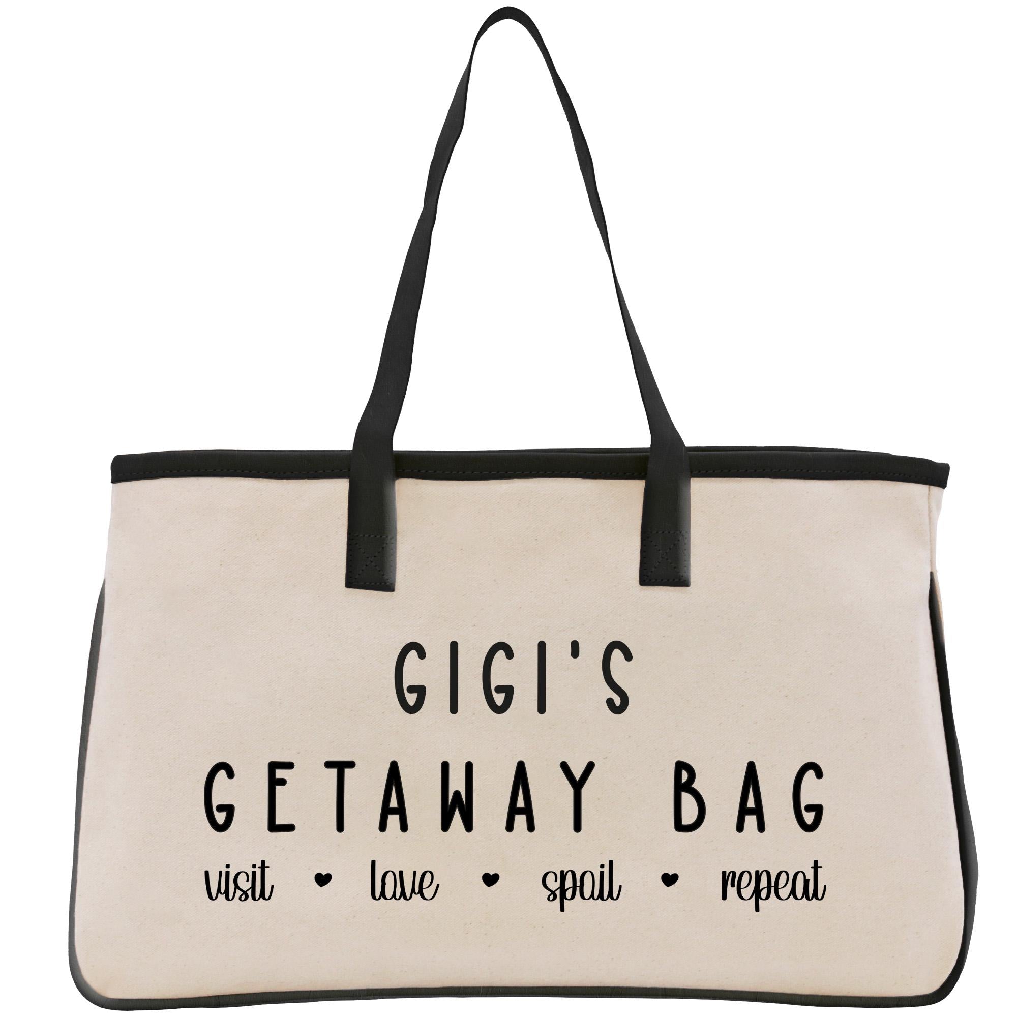 a white bag with black handles and writing on it