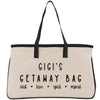 a white bag with black handles and writing on it