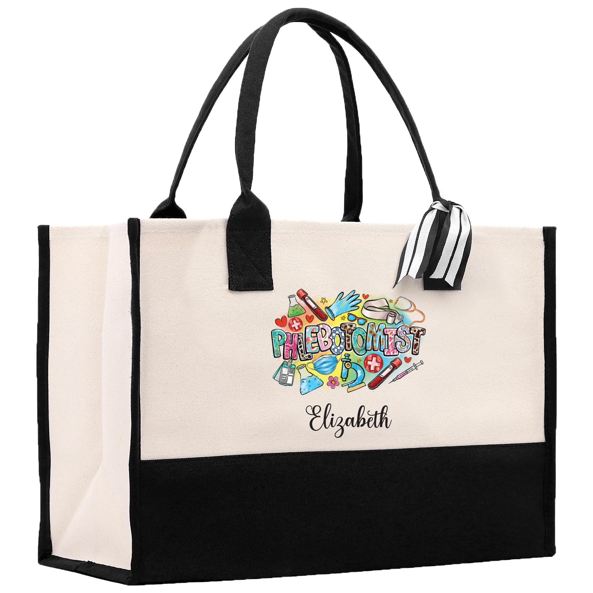 a black and white tote bag with a name on it