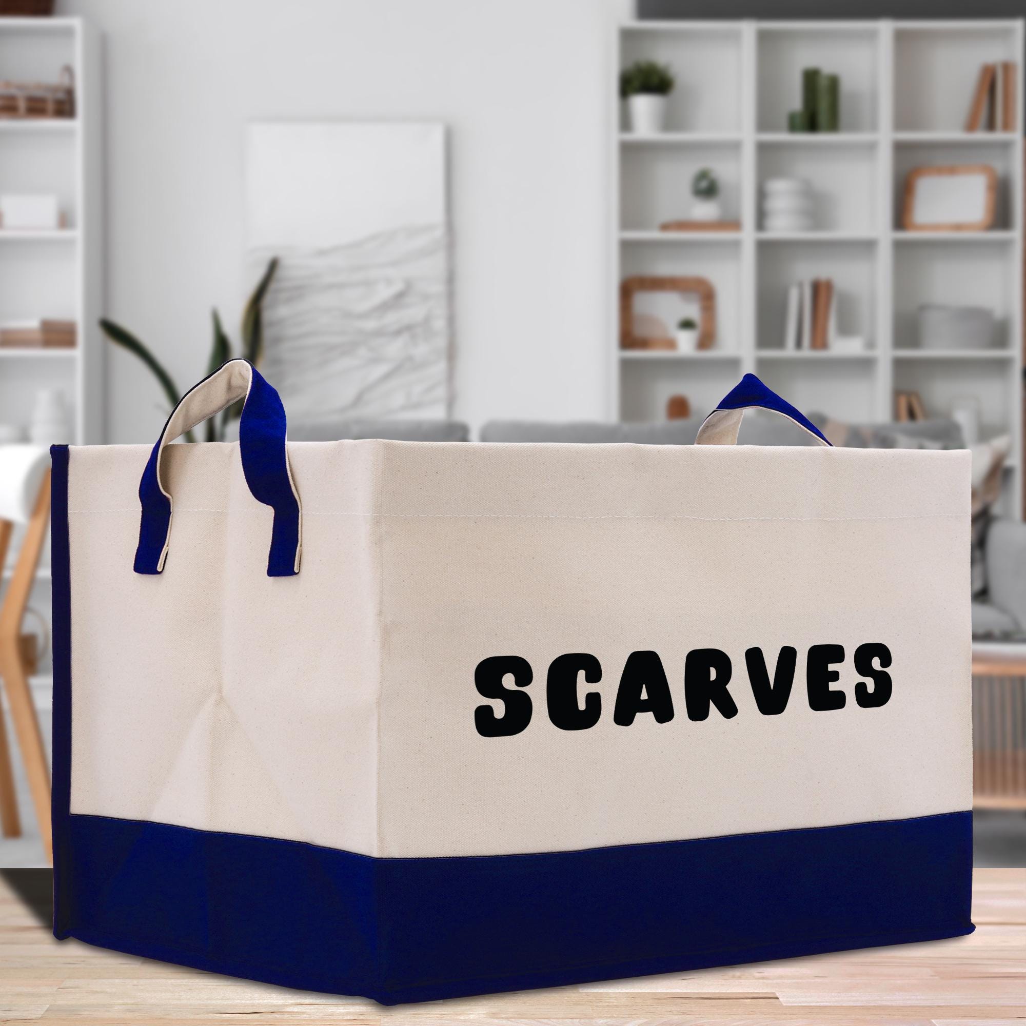 a white and blue shopping bag with the word scarves printed on it