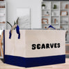 a white and blue shopping bag with the word scarves printed on it