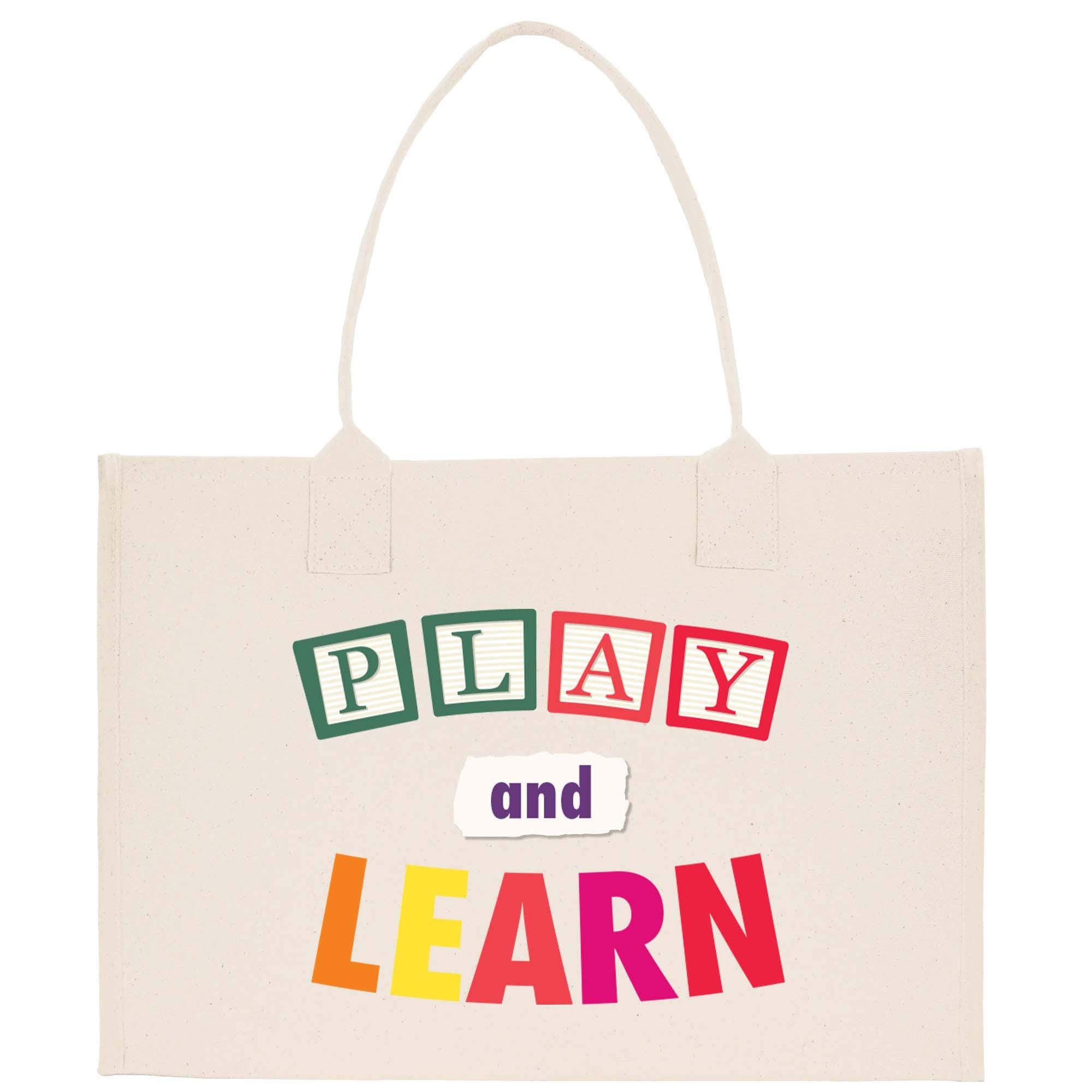 a white bag with the words play and learn printed on it