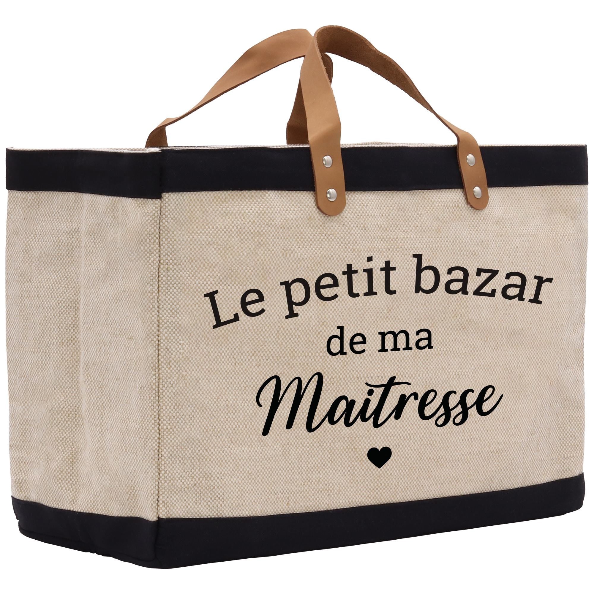 a canvas bag with a leather handle that says le petit bazarr de ma
