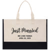 a black and white bag with the words just married printed on it