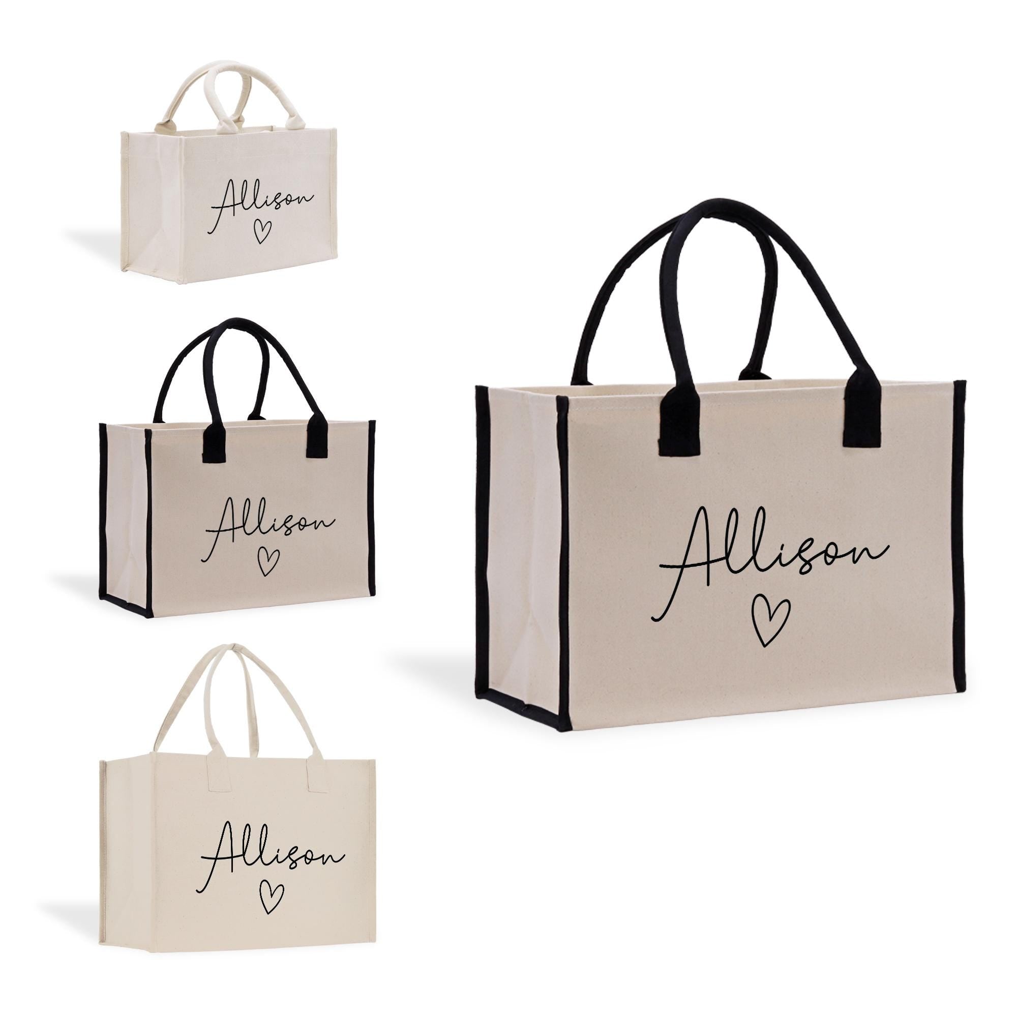 a set of three personalized shopping bags