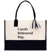 a black and white bag with a black and white striped handle