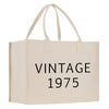 a white shopping bag with the words vintage on it