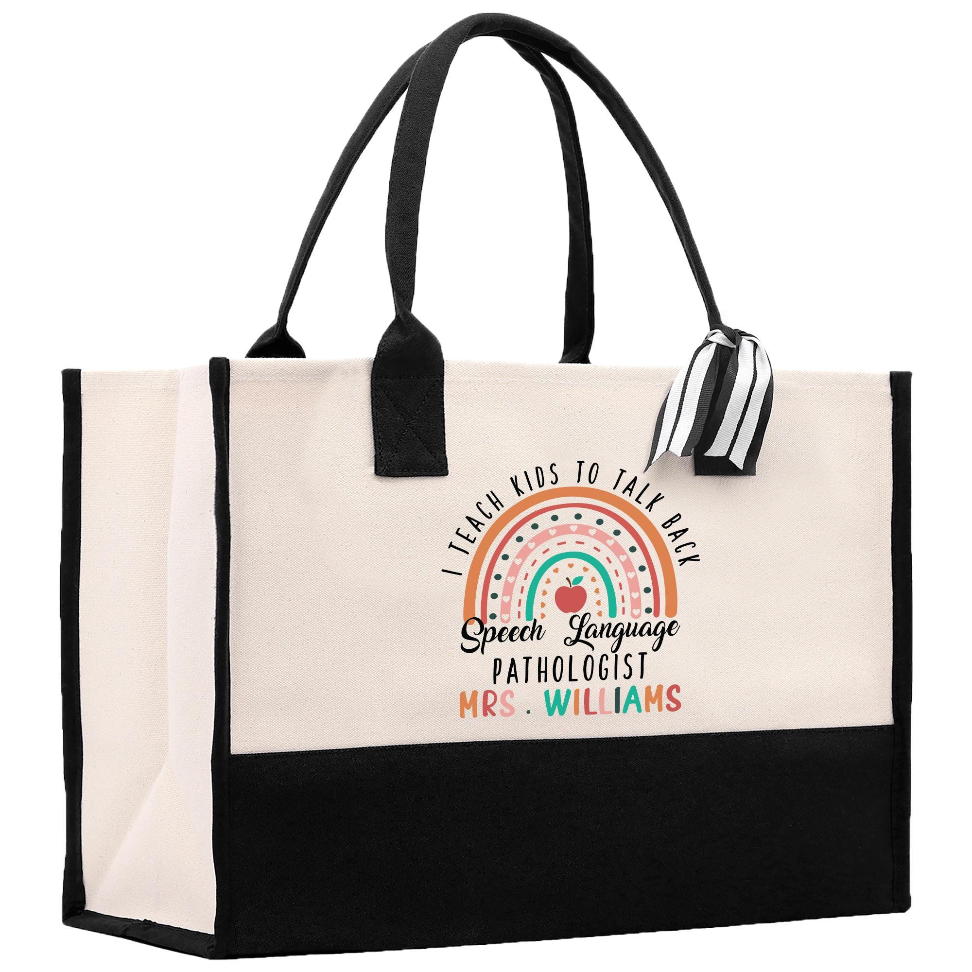 a black and white bag with a rainbow on it