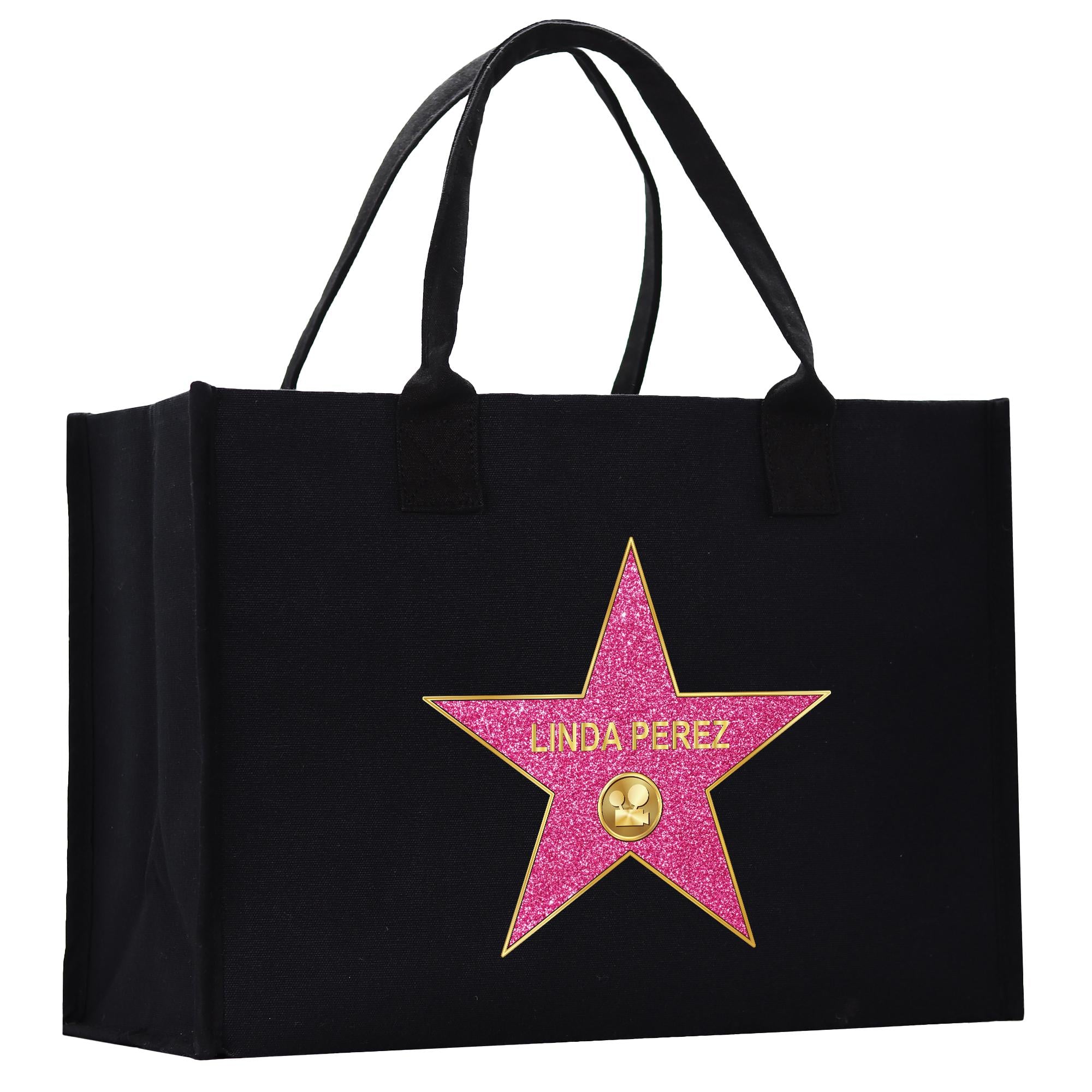 A black tote bag with a pink star-shaped logo featuring the name &#39;Linda Perez&#39; on it.