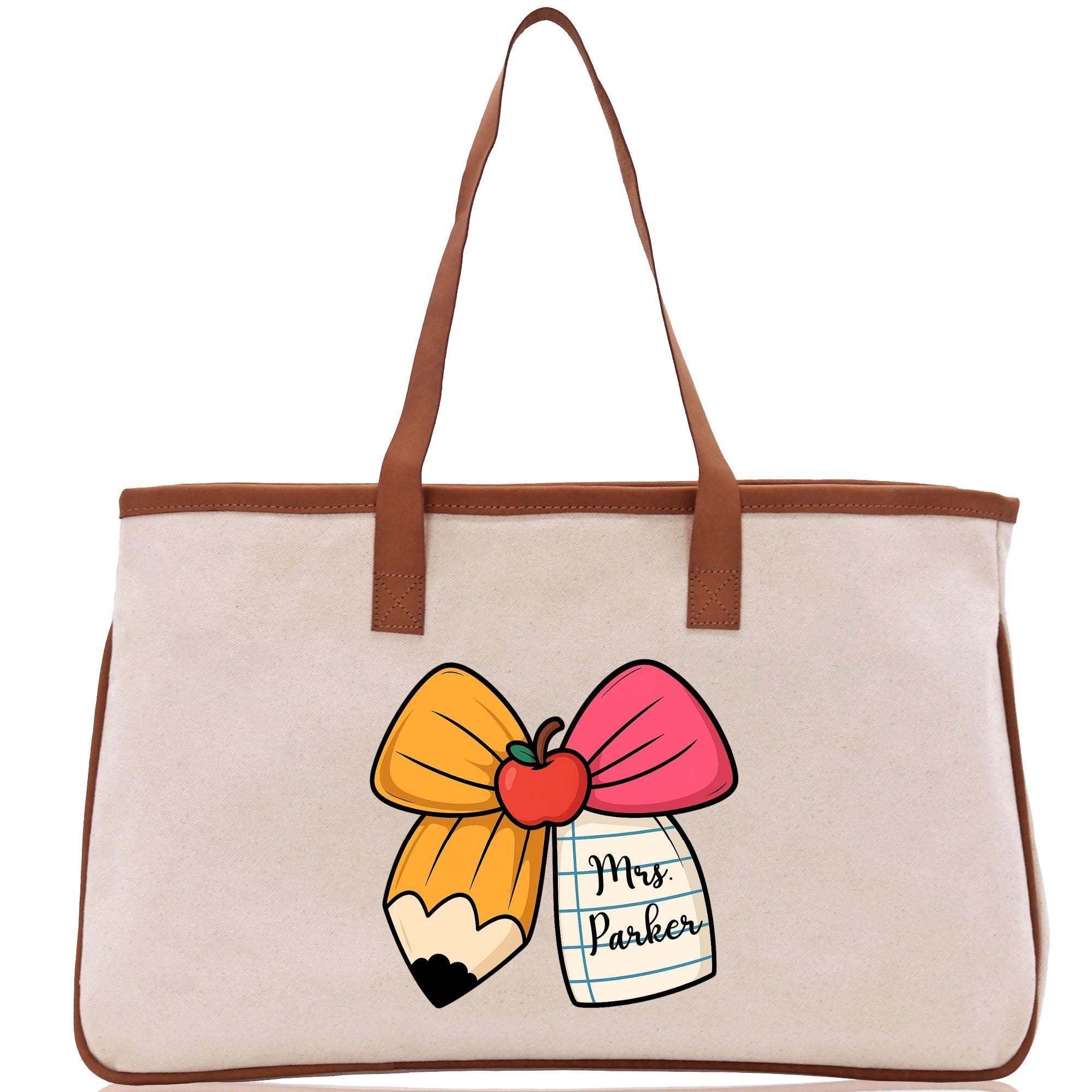 a bag with a pencil and a bow on it