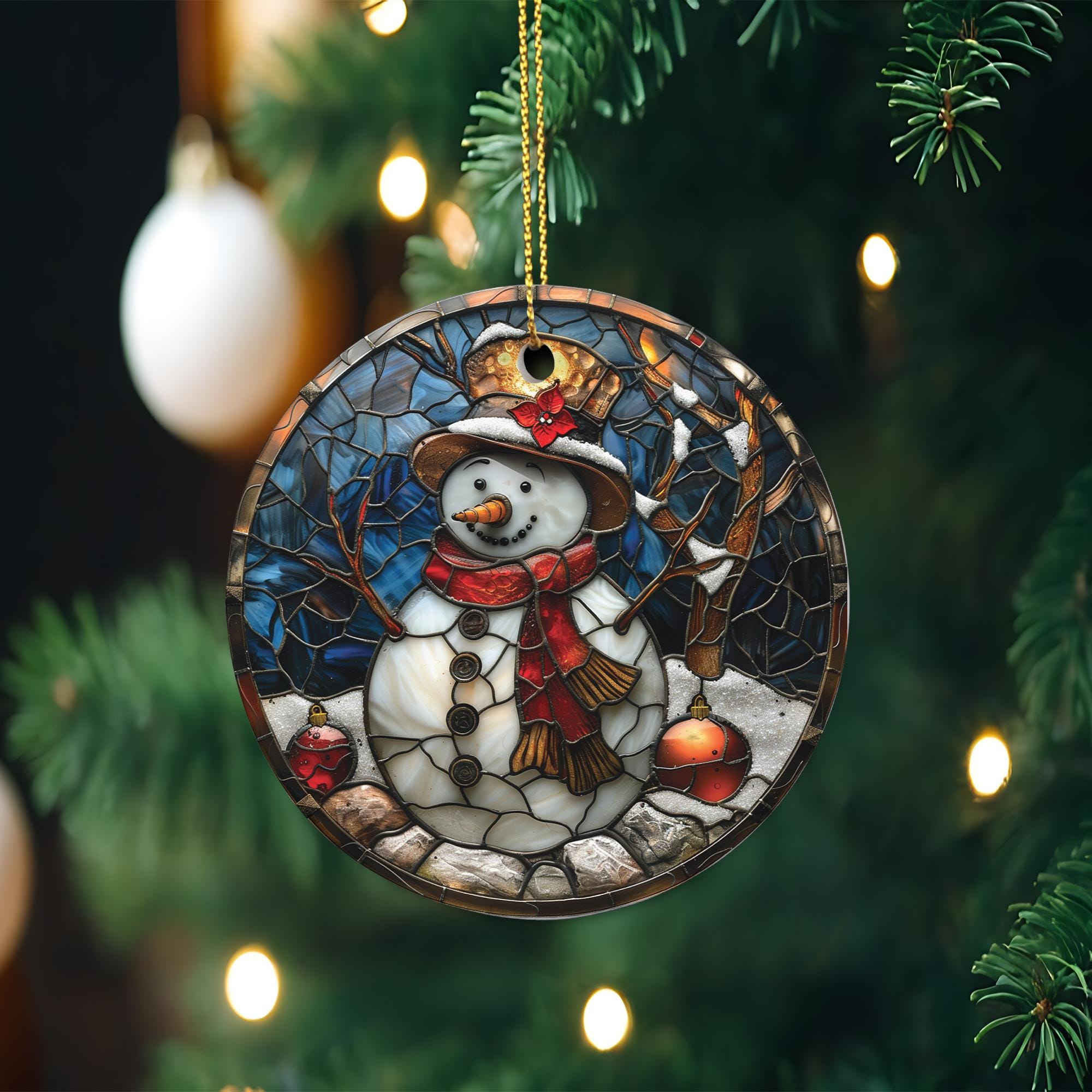 A stained glass ornament featuring a snowman is hanging on a Christmas tree, surrounded by twinkling lights.