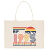 A beige canvas tote bag with a graphic design featuring a sunset, mountains, and the text 