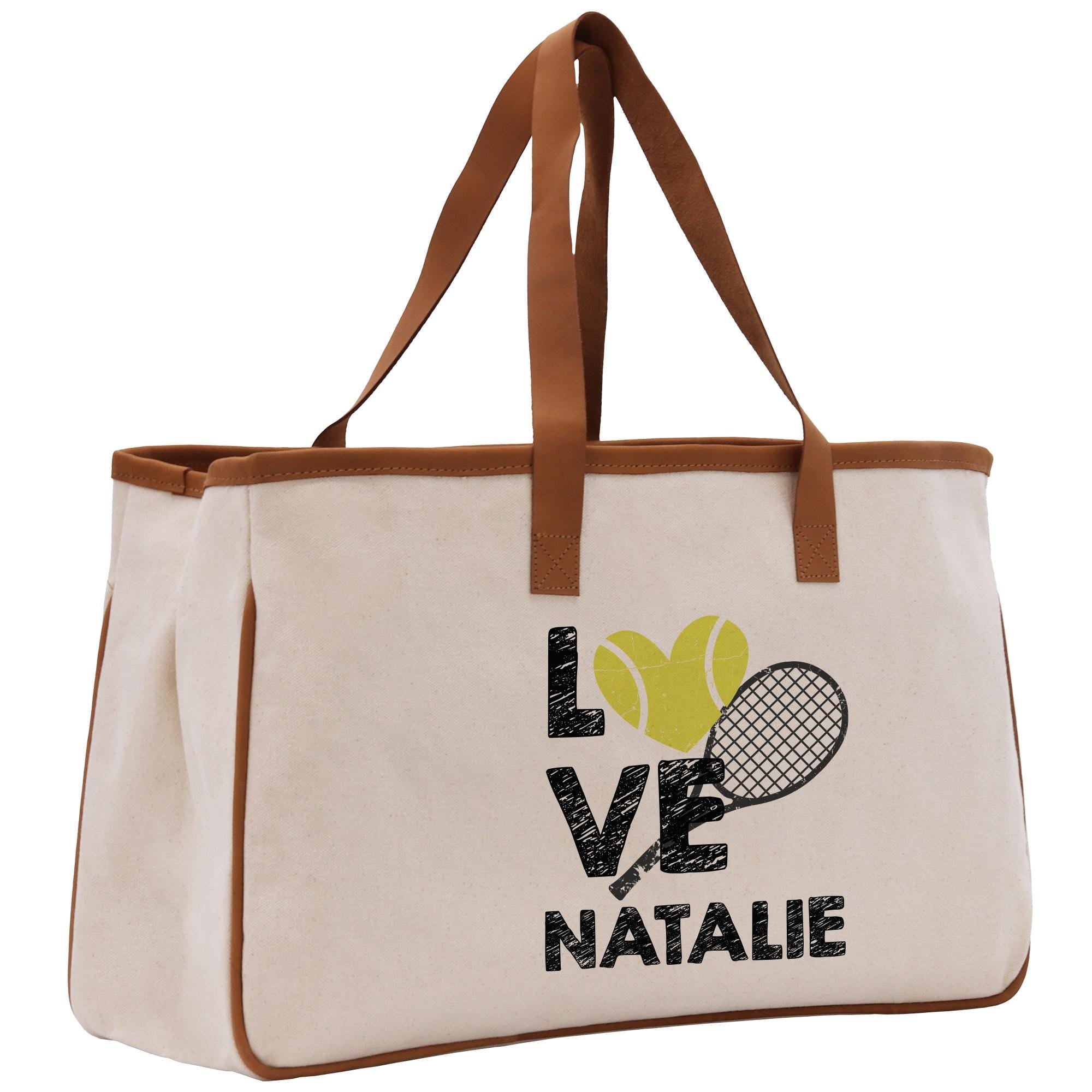 a bag with a tennis racket and ball on it