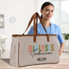 a woman in a blue shirt is holding a canvas bag