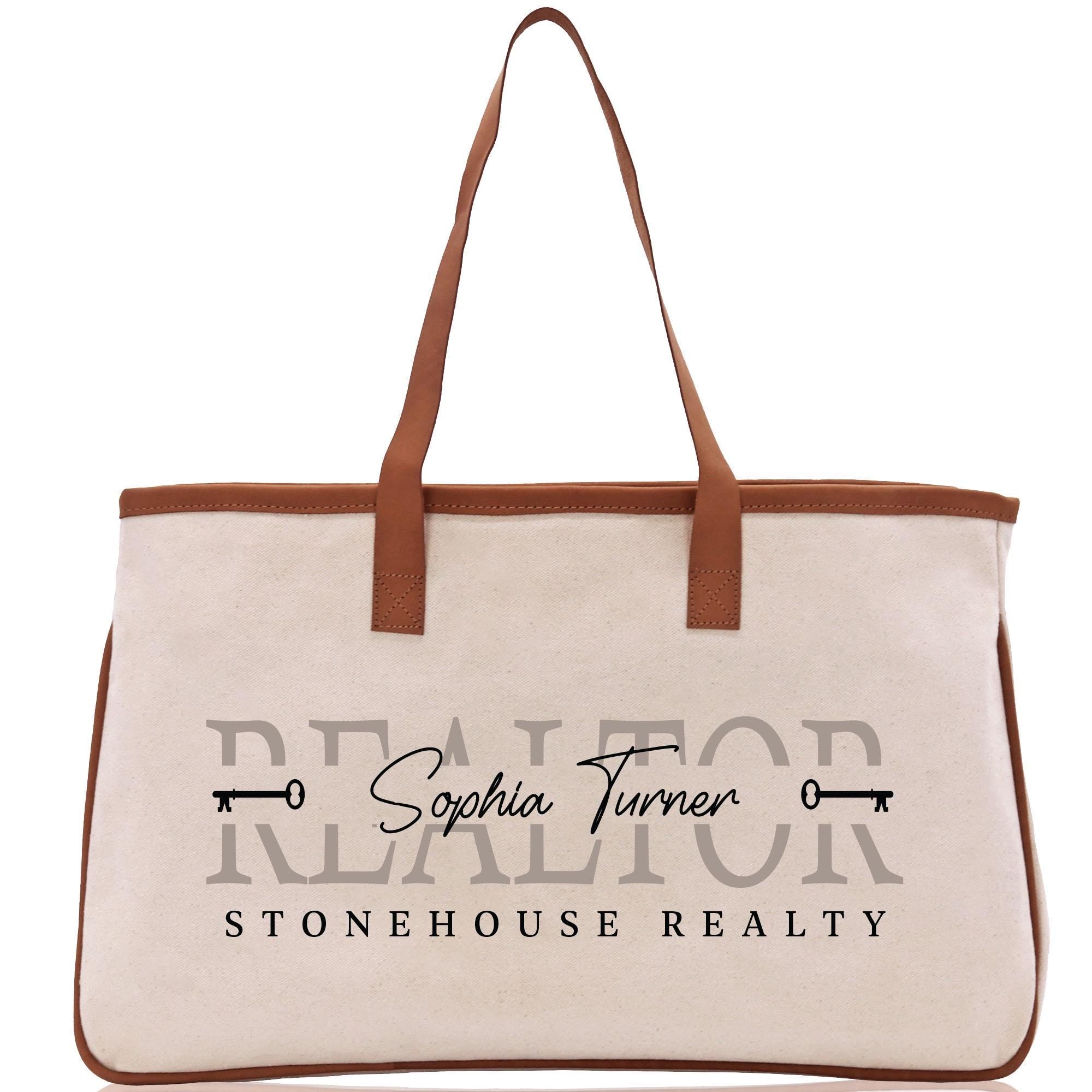 a canvas tote bag with a logo on it