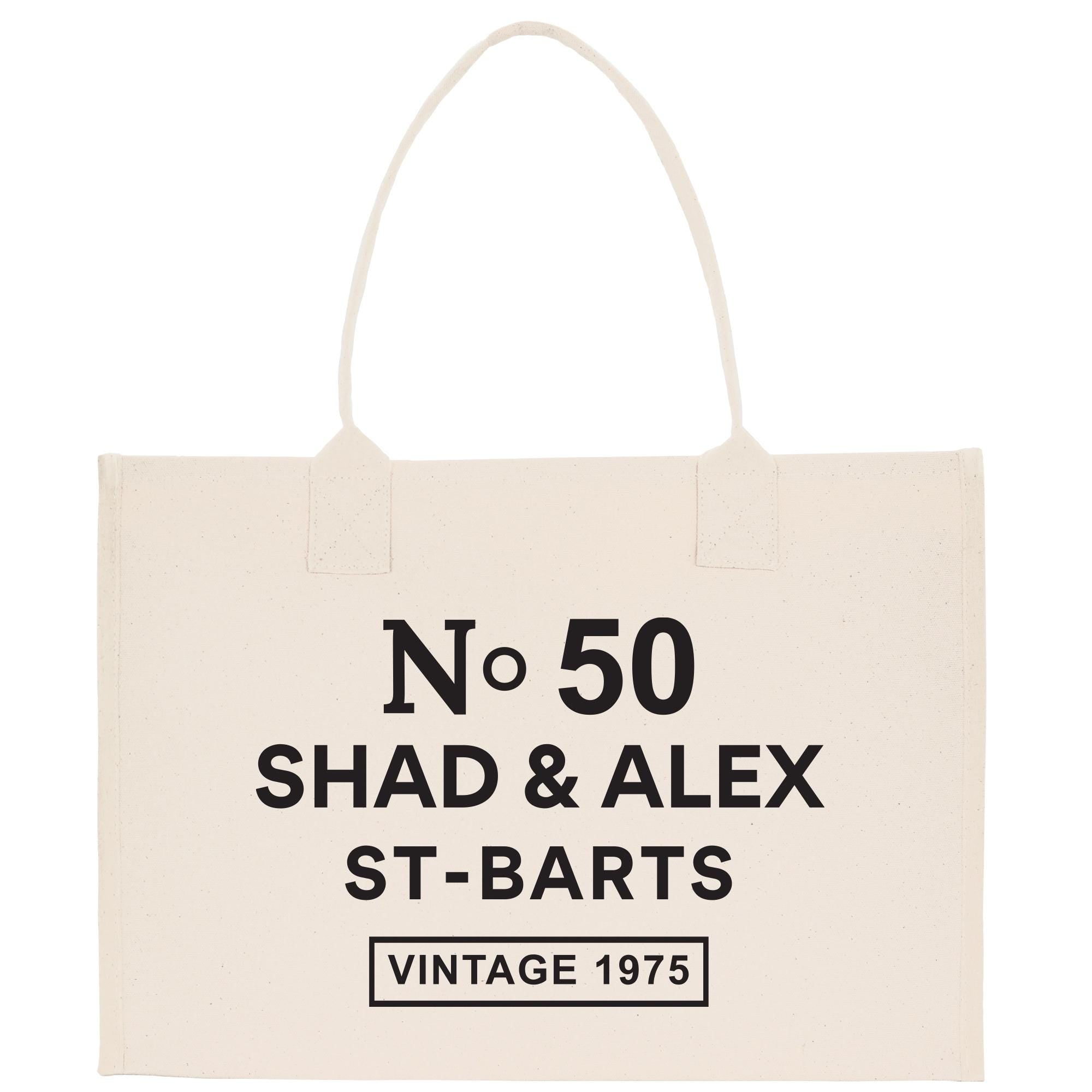A beige tote bag with black text and graphics printed on it.