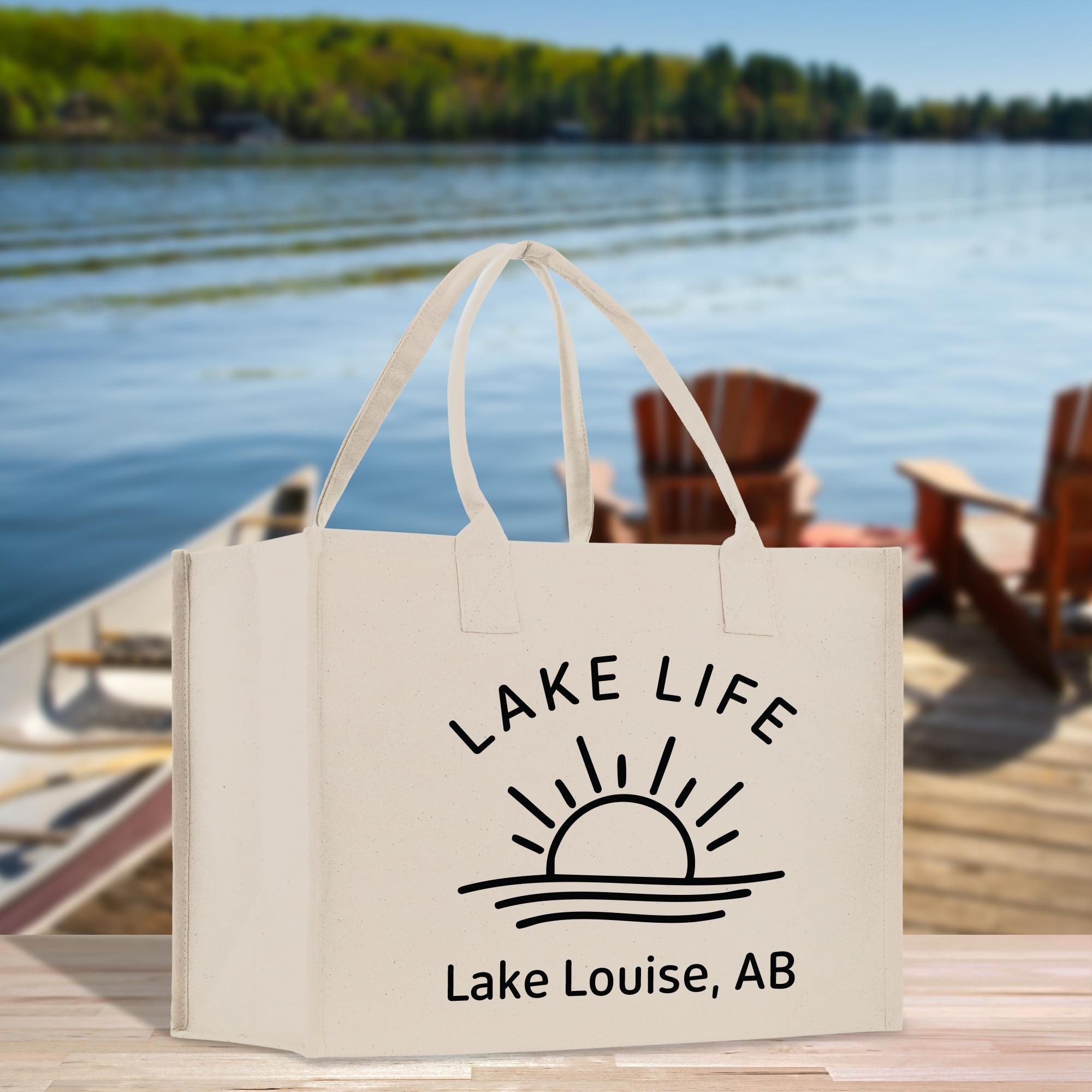 a lake life bag sitting on a table next to a lake