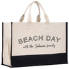a black and white beach bag with the words beach day with the johnson family