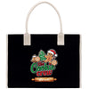 A black tote bag with a white handle and a graphic design featuring a gingerbread man, a Christmas tree, and the text "The Cookie Crew" and "Sarah".