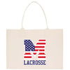 a white shopping bag with the word m and an american flag on it