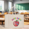 a white bag with a picture of an apple on it