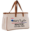 a white bag with a brown leather handle
