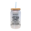 a glass bottle with a straw in it