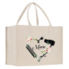 a white shopping bag with a heart shaped design