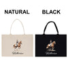 two bags, one beige and one black, both featuring a horse and rider graphic. The bag on the left is labeled "NATURAL" and the bag on the right is labeled "BLACK".