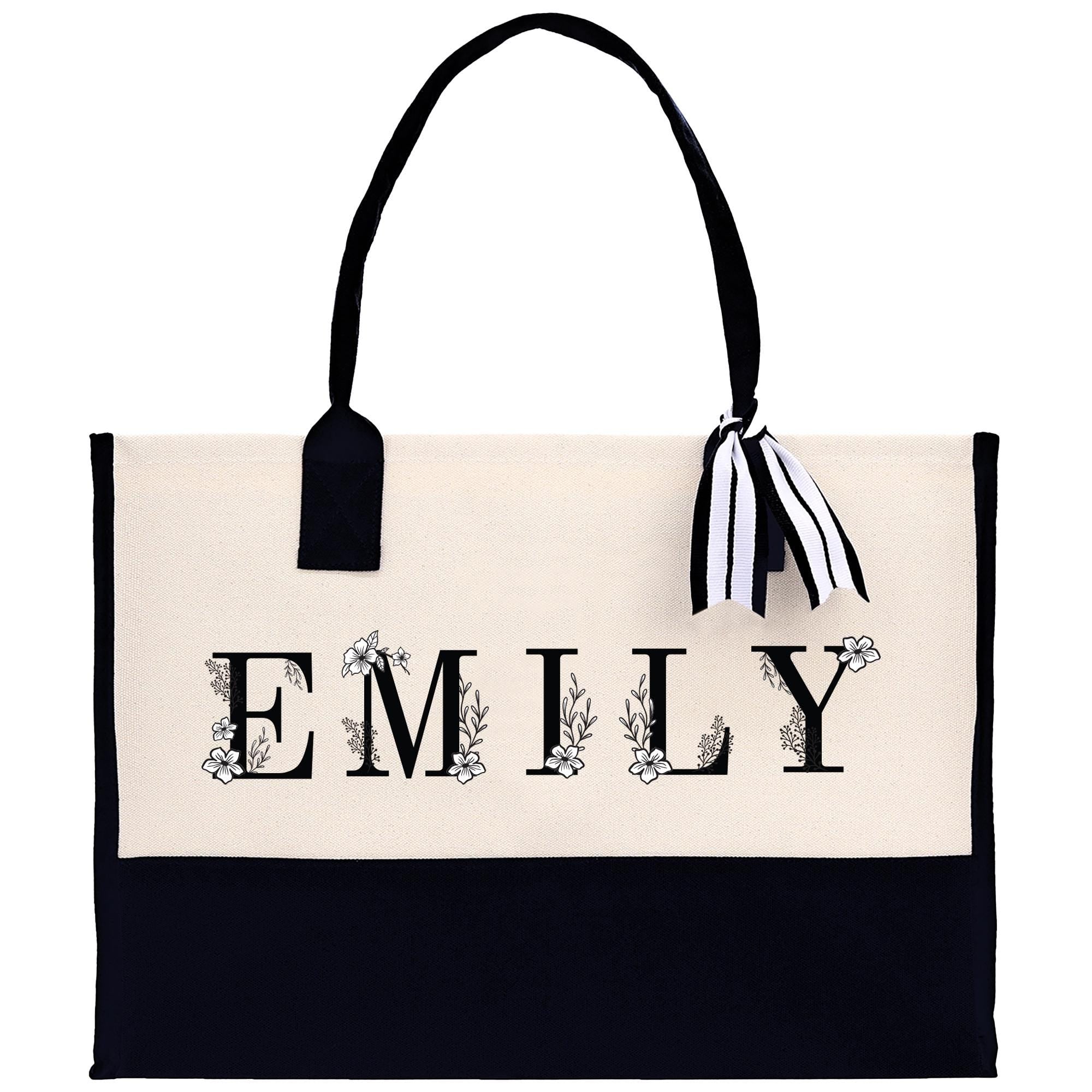 a black and white bag with a name on it