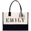 a black and white bag with a name on it