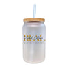 a white mason jar with a straw in it