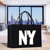 a black bag with the statue of liberty on it