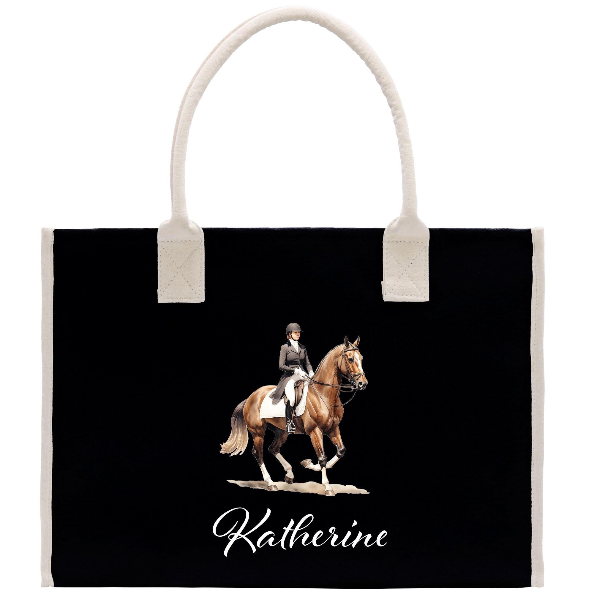 A black tote bag with a white handle and a printed image of a person riding a horse on it.