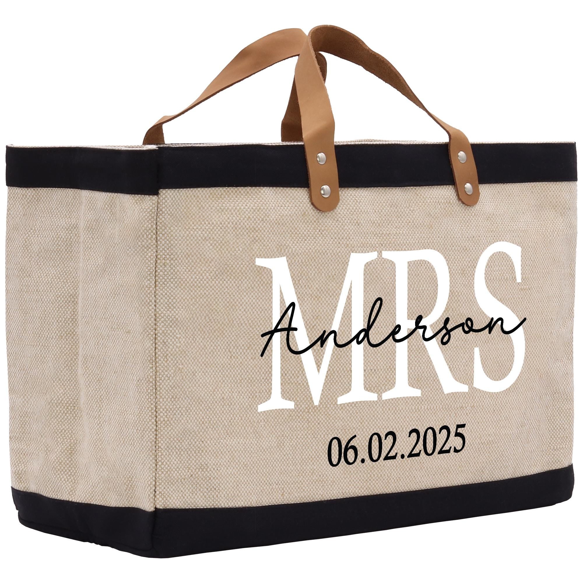 a personalized canvas tote bag with leather handles