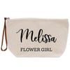 a white zippered bag with a name on it