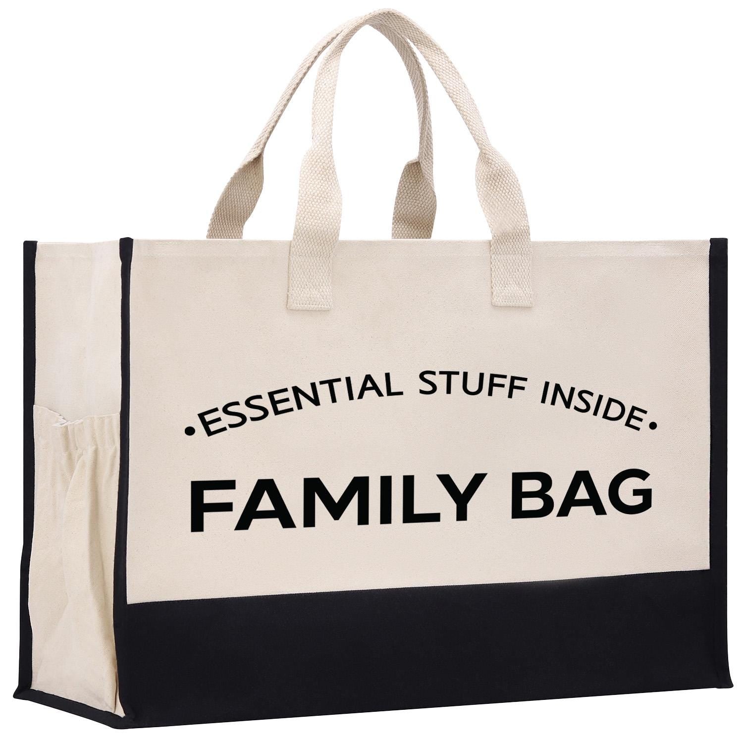 a black and white shopping bag with the words essential stuff inside