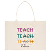 a tote bag with the words teach on it