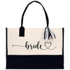 a black and white tote bag with a bride written on it