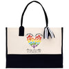 a white and black bag with a heart on it