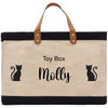 a canvas tote bag with a black cat on it