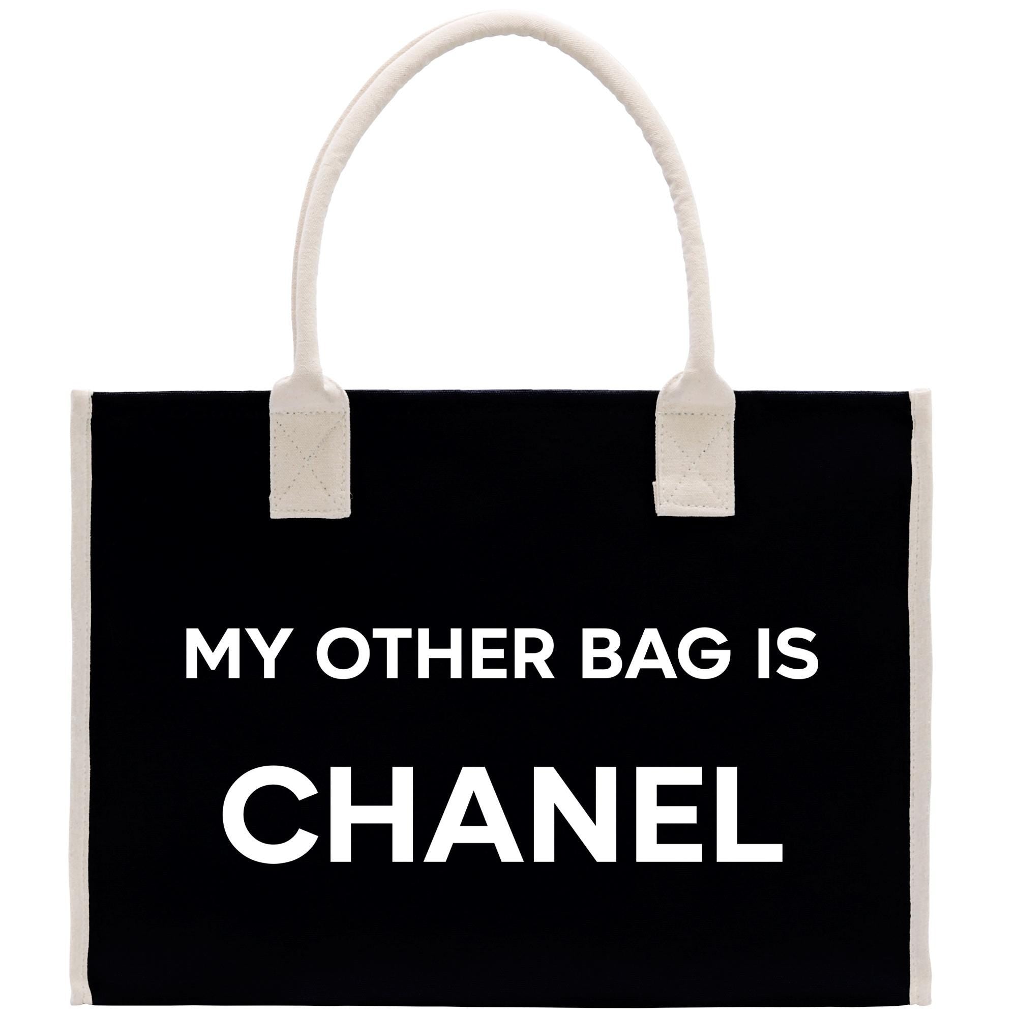 a black and white bag with the words, my other bag is chanel