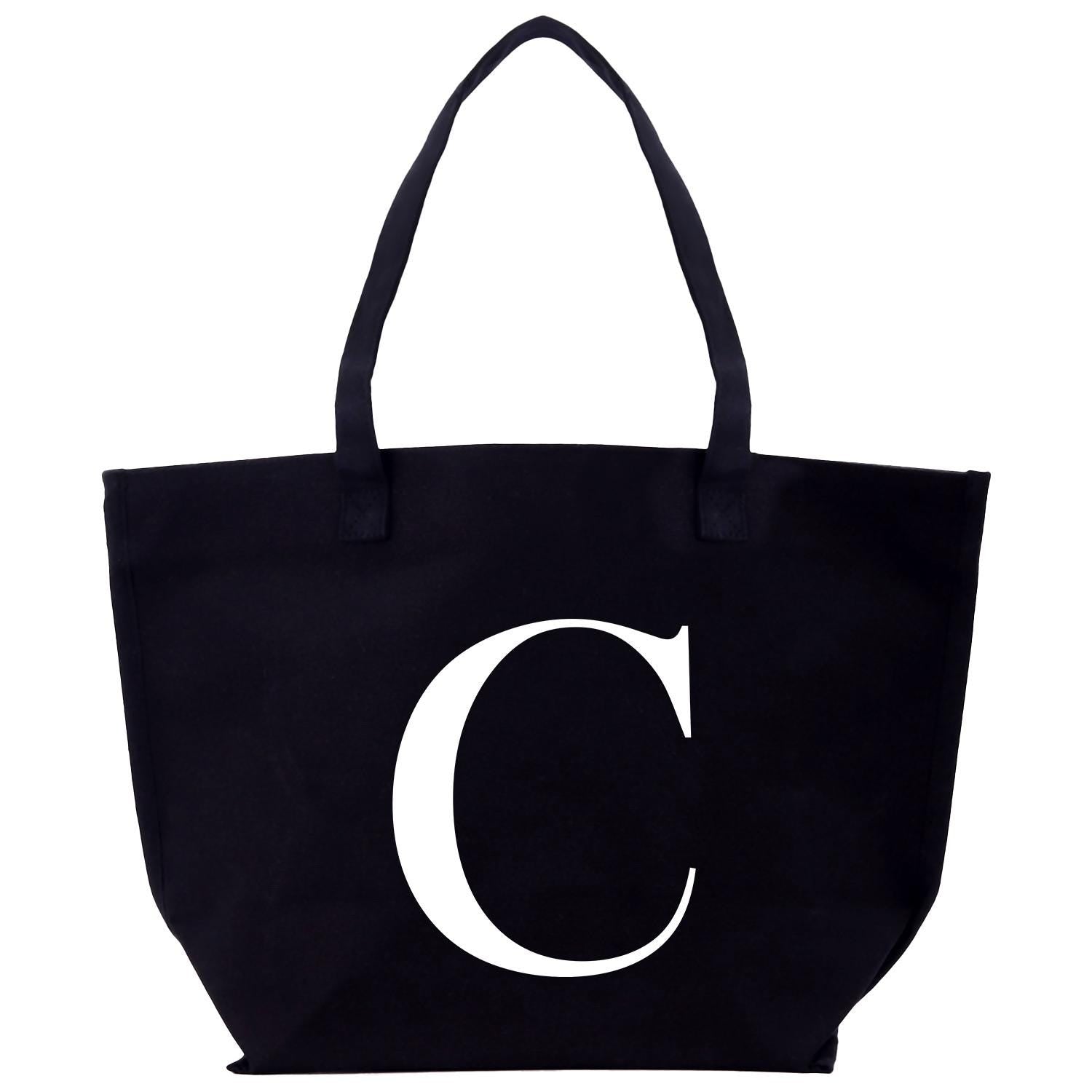 a black tote bag with the letter c on it
