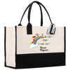 a black and white bag with a rainbow on it