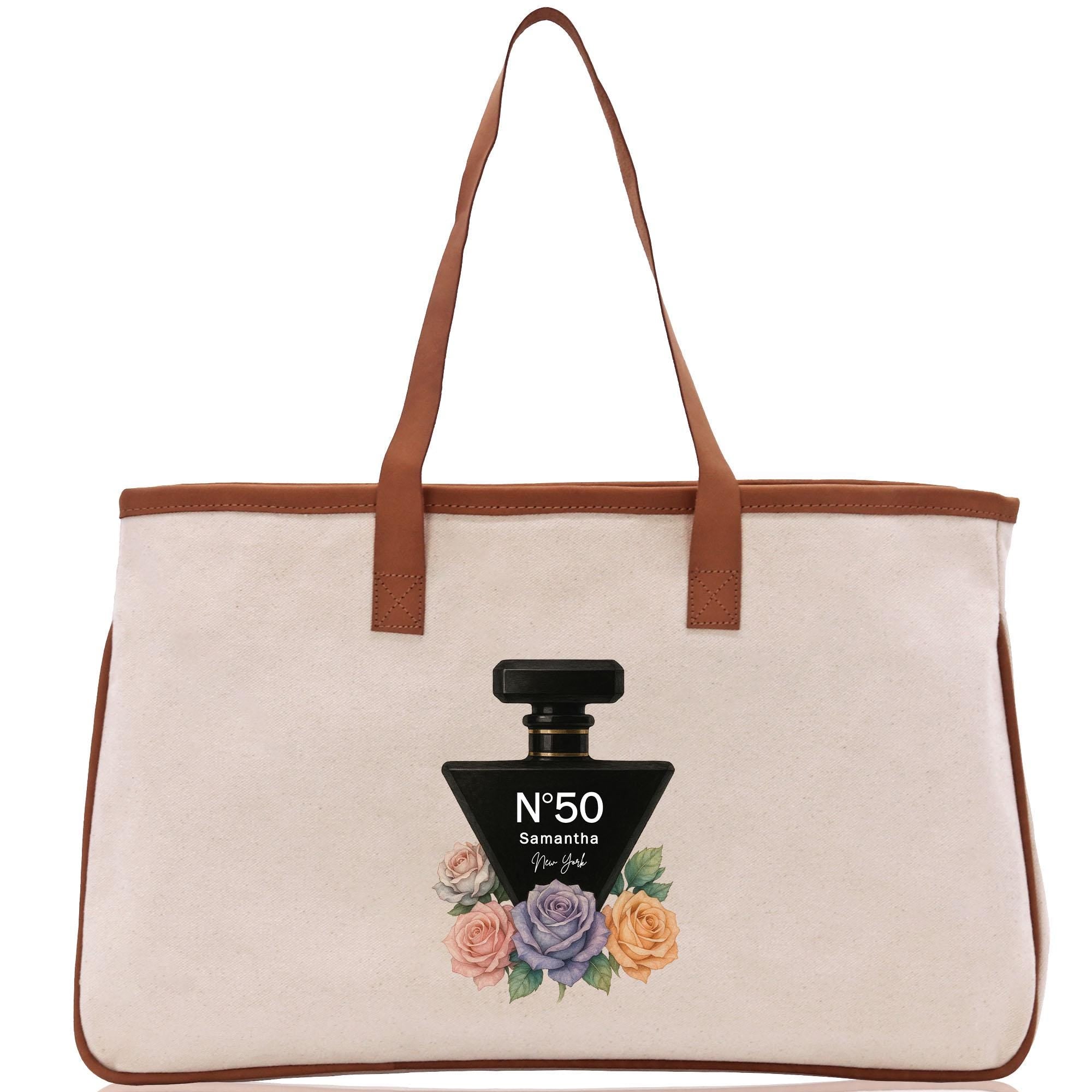 a bag with a bottle of perfume on it